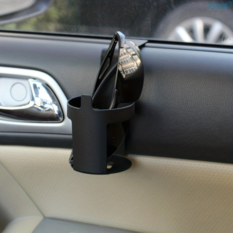 Ontdek onze Universele Auto Bekerhouder - perfect voor onderweg! Makkelijk op te hangen aan je auto- of vrachtwagenraam, houdt je drankjes stevig op hun plek, zelfs op hobbelige wegen.